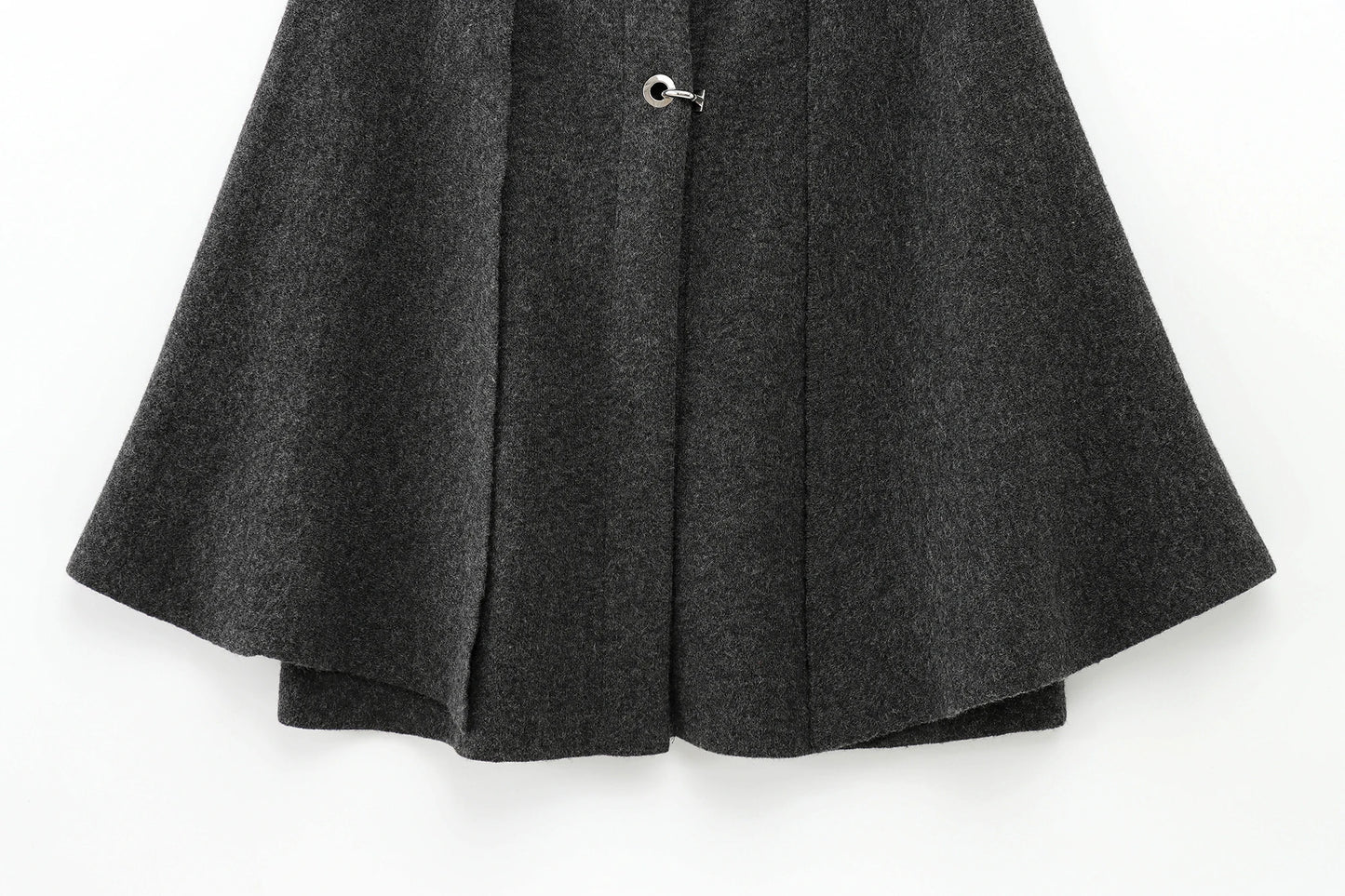 Dark gray cape with a button on a white background