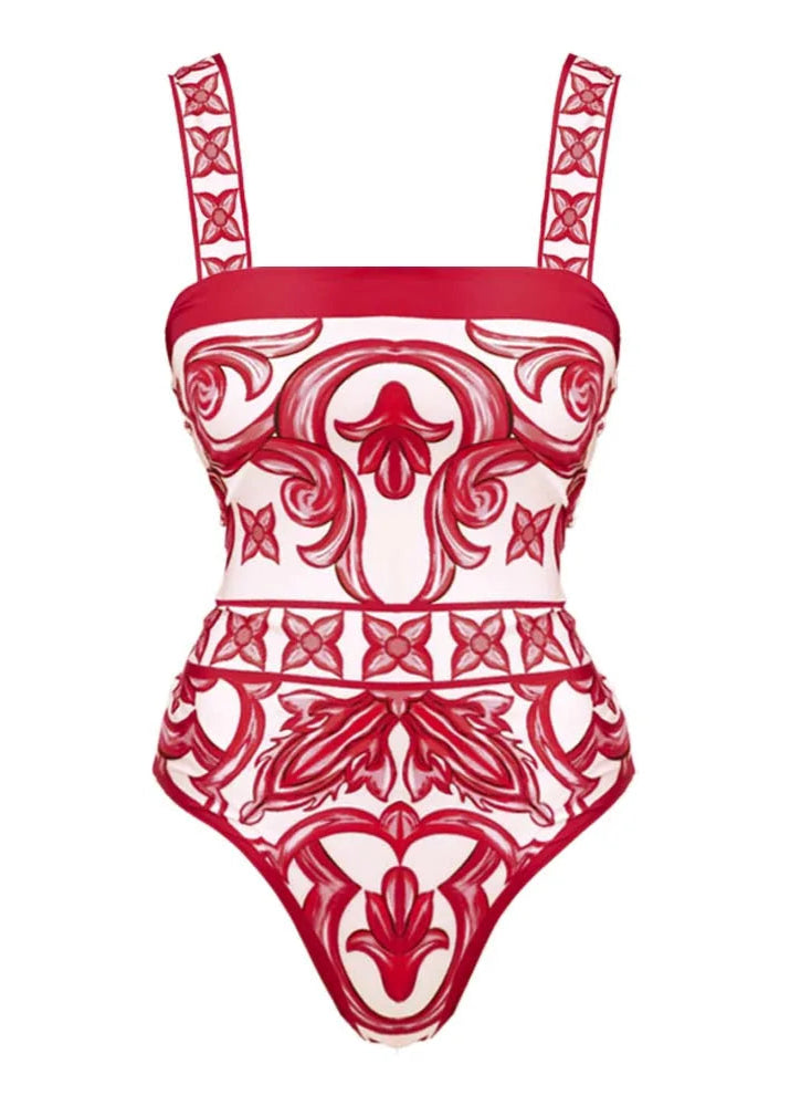 Red and white patterned swimsuit on a white background