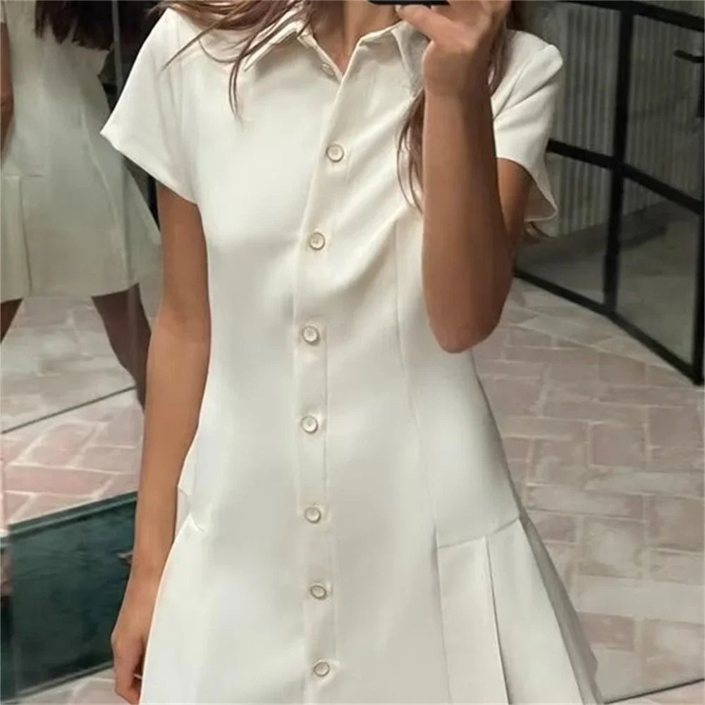 Flowy Polo Mini Dress with Pleated Skirt LAPANIA