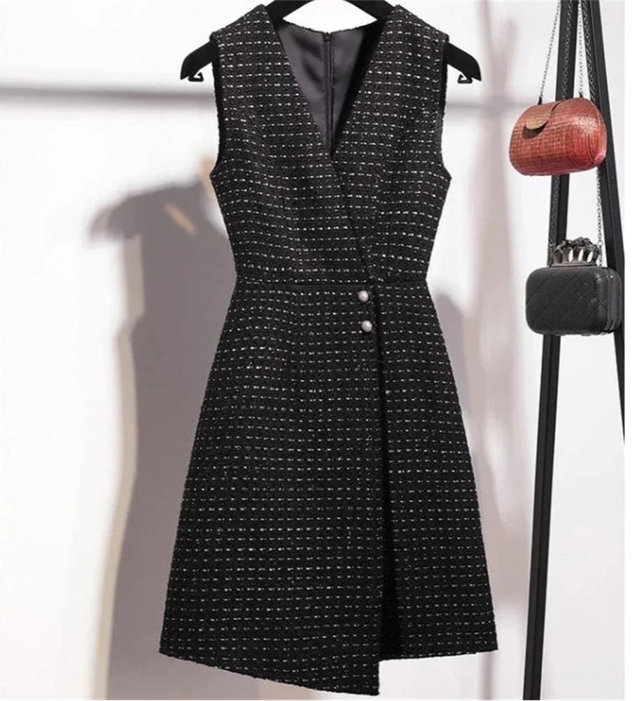 A slim-fit woolen vest dress in beige, featuring a flattering V-neck and modern silhouette, ideal for office or casual wear.