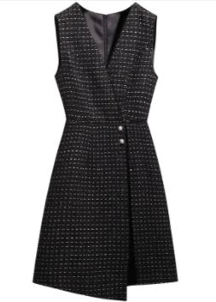 A stylish woolen vest dress with a V-neck and asymmetrical hem, perfect for a chic autumn or spring workwear look.