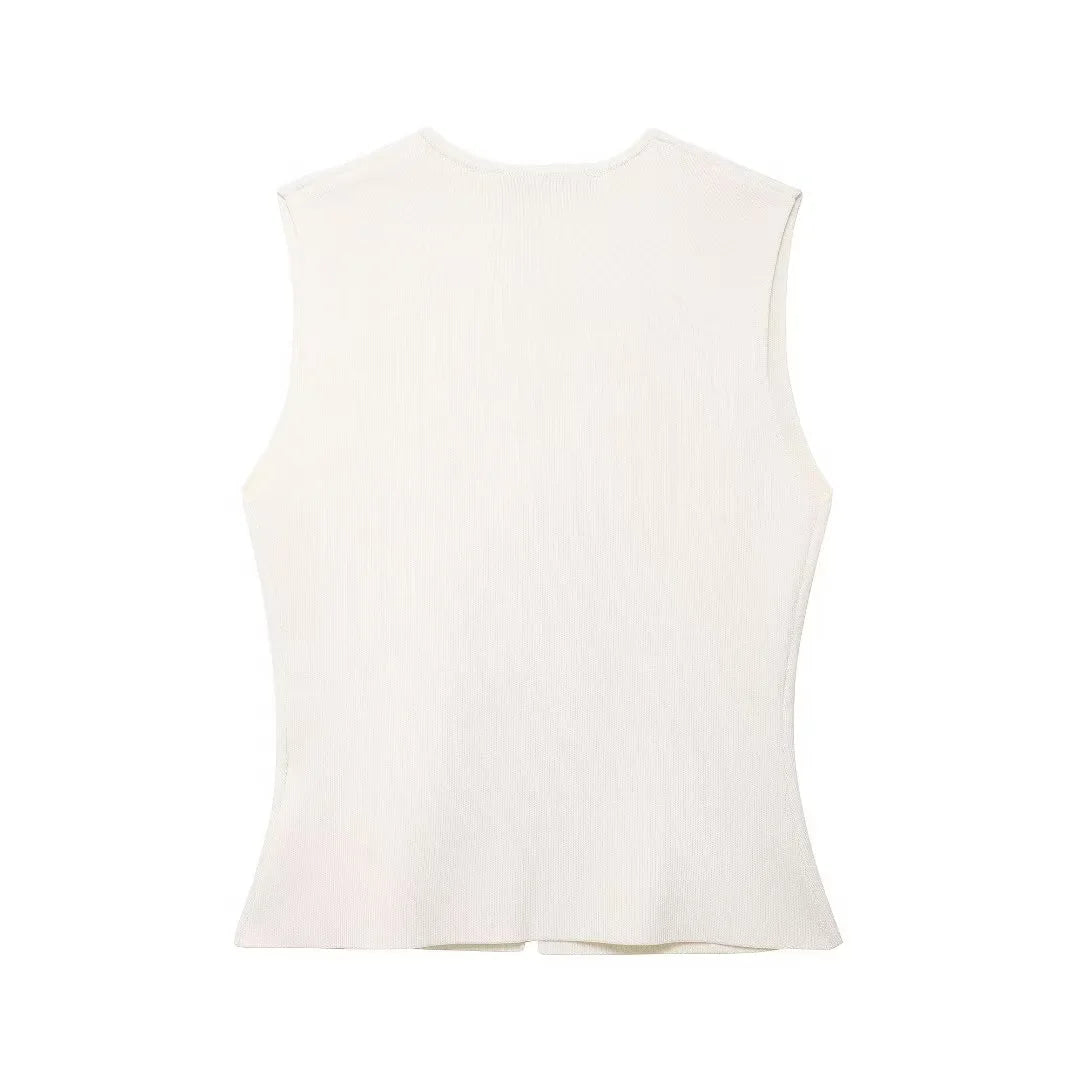Back view of a white basic knit top showing the design and fit.