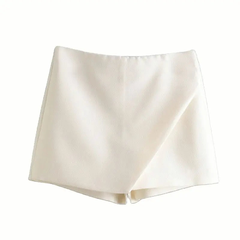 Beige asymmetrical high-waist skort with side zipper, a versatile and elegant choice for any outfit