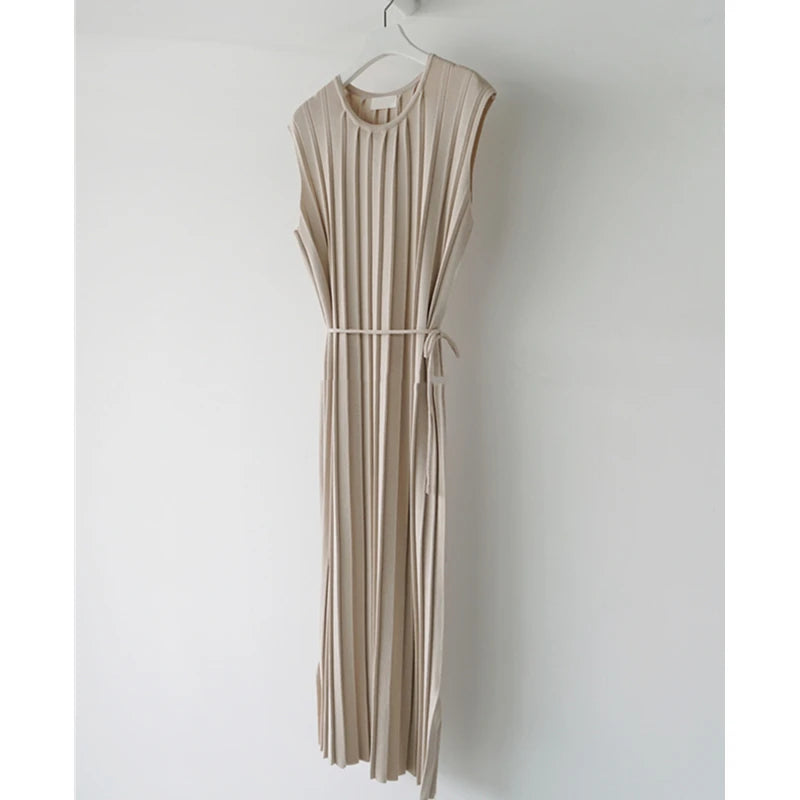 Casual beige knitted tank dress with a loose fit and side split for a chic vibe