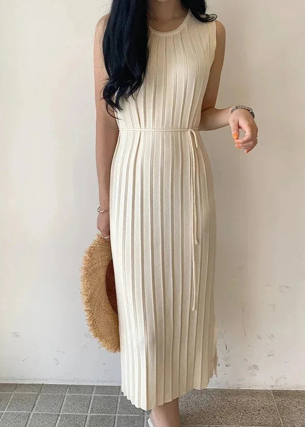 Beige knitted tank dress with a high waist and side split, perfect for casual summer outings.