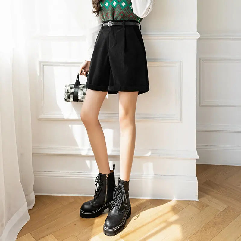 Black Corduroy High-Waist Shorts, showcasing a trendy and chic look.