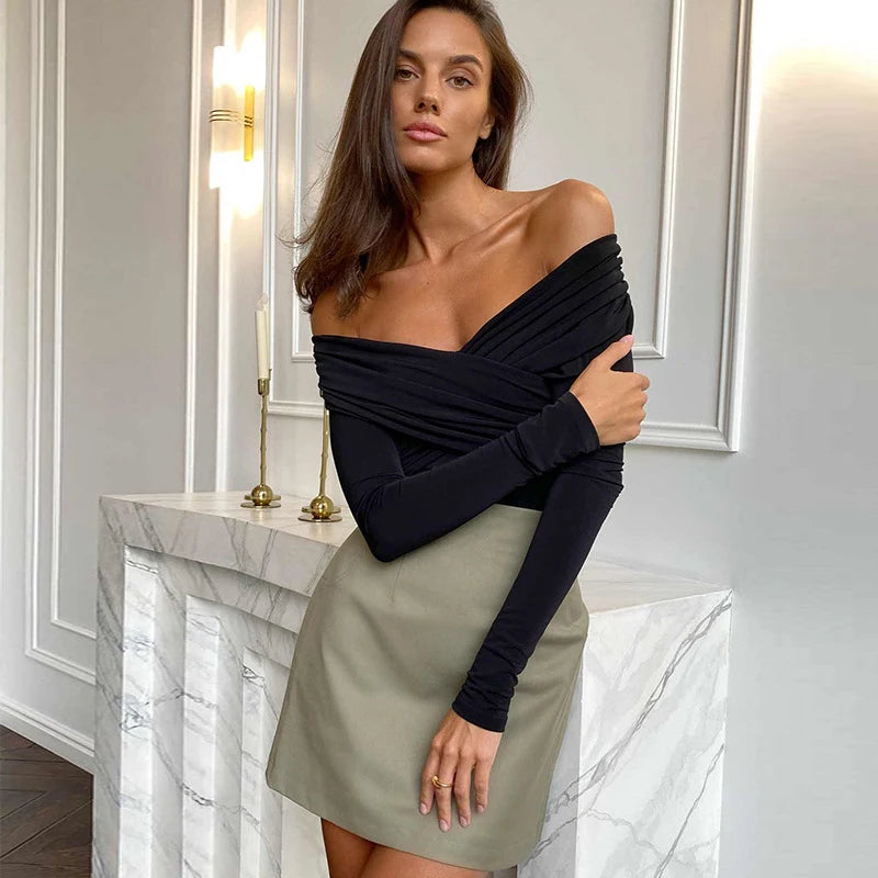 Modern black corset bodysuit with an off-shoulder design, ideal for chic outfits.