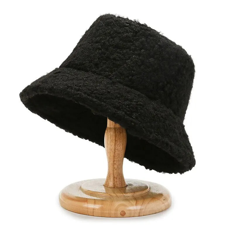 Black teddy bucket hat with Harajuku-inspired style, ideal for sleek winter fashion.