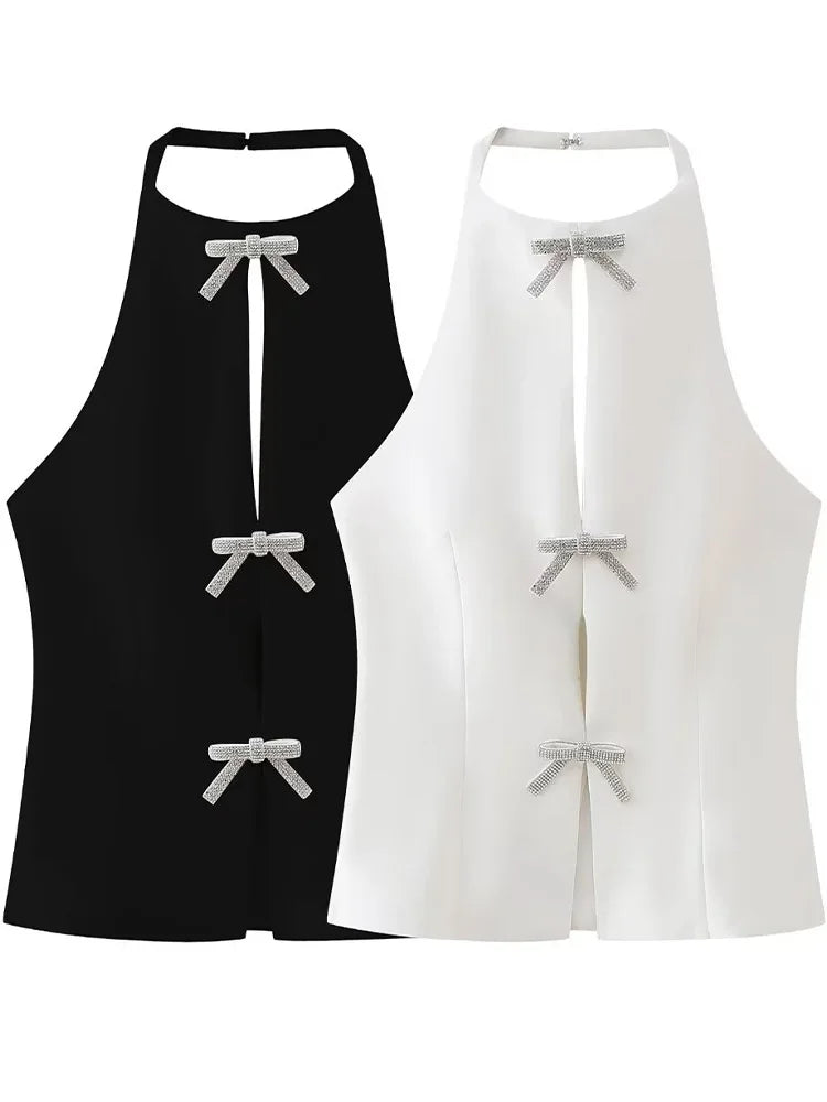 Elegant black and white halter neck tops featuring diamond bows, ideal for chic evening wear or special occasions.