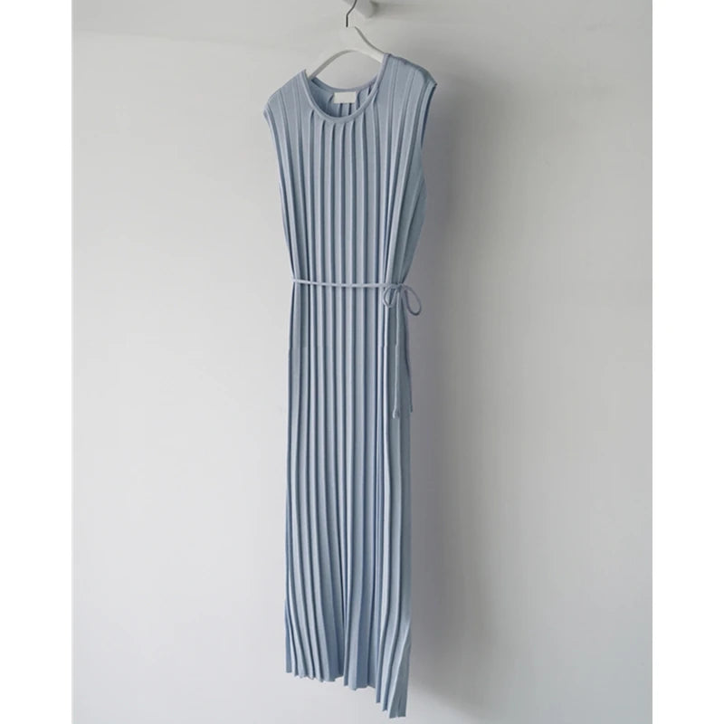Blue knitted tank dress with a mid-calf length and side split, perfect for stylish summer wear.