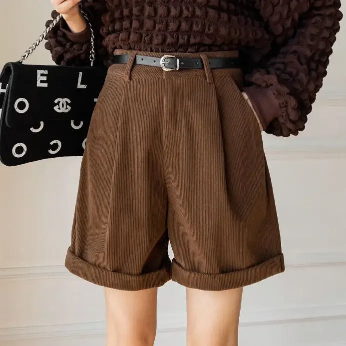Zoomed-in view of the model wearing Brown Corduroy High-Waist Shorts, highlighting the stylish fit and fabric details.