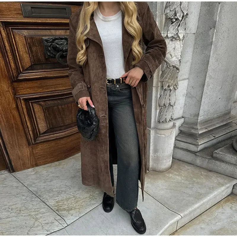 Brown Suede Long Coat in natural lighting to show its rich suede material