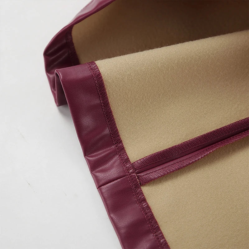 Detailed shot of the Burgundy Leather Mini Skirt, showcasing the inside of the fabric.