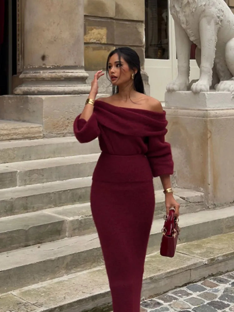 Close-up view of the Burgundy off-shoulder knitted maxi dress showcasing the fabric texture.