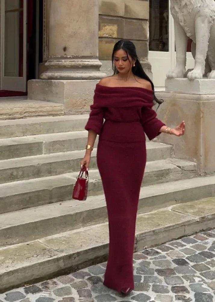 Burgundy off-shoulder knitted maxi dress worn by model with elegant styling