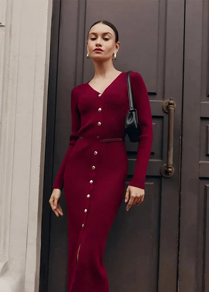 Burgundy V-neck knitted long dress worn by model, showcasing an elegant, chic style.