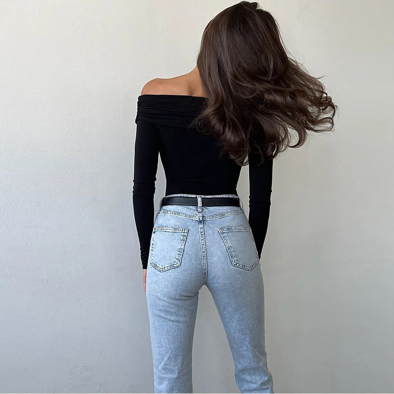 Chic black corset bodysuit featuring an off-shoulder cut, perfect for formal occasions.