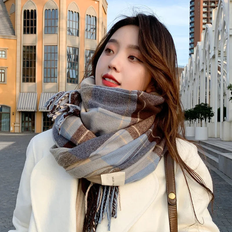 Close-up of blue variant plaid winter scarf, showcasing checkered pattern and soft material