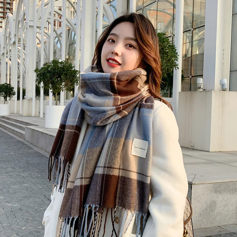 Model styled in blue plaid winter scarf, checkered shawl for a chic winter look