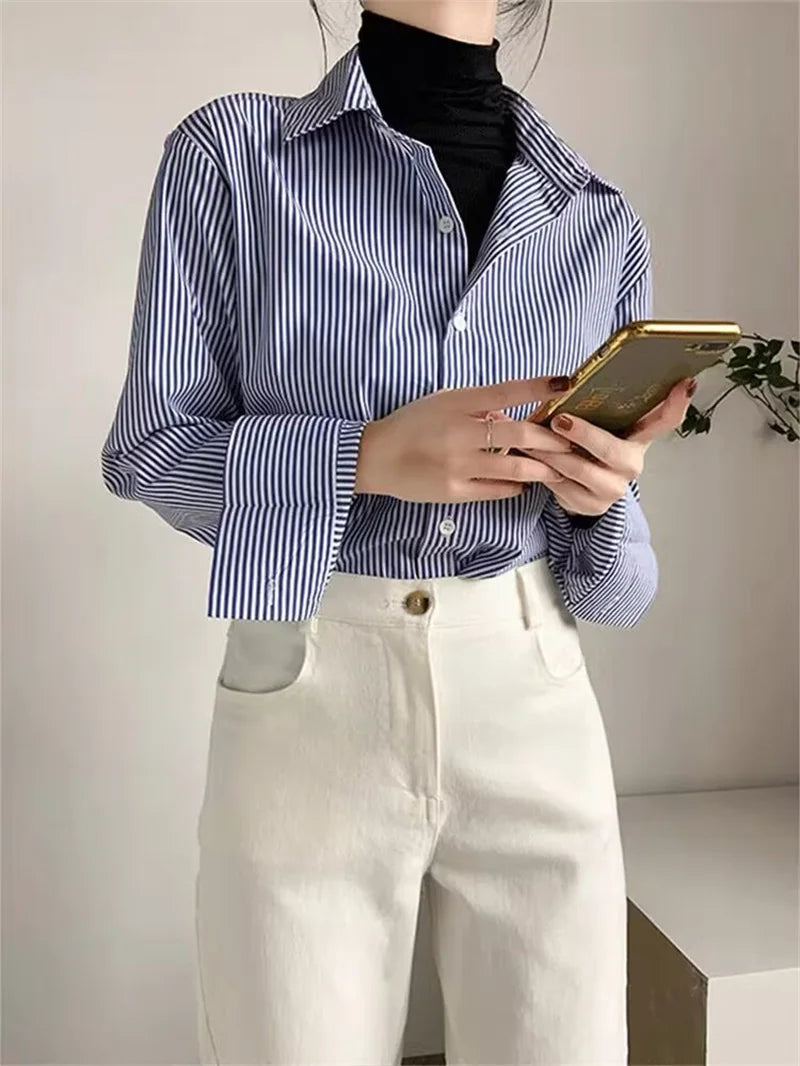 Striped blouse styled in a professional working outfit for a modern business look