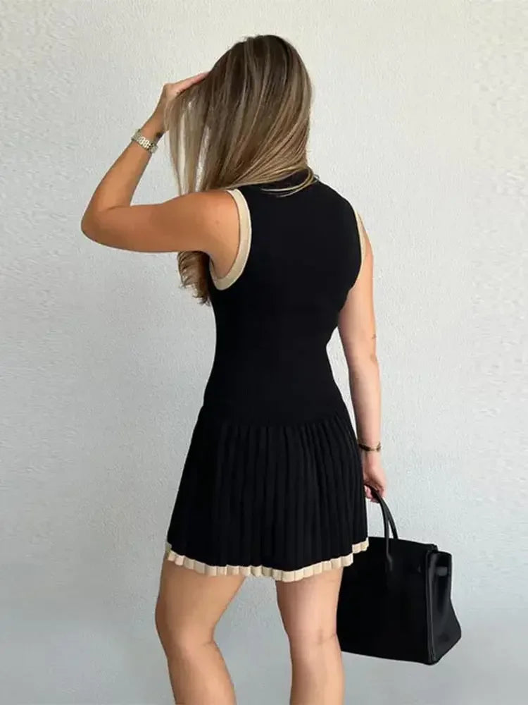 Back view of the Color Blocked Knitted Mini Dress, showing the elegant design and flattering bodycon silhouette.