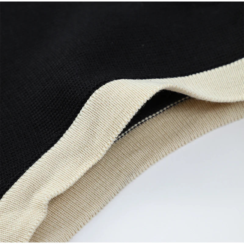 Close-up of the knit fabric used in the Color Blocked Knitted Mini Dress, highlighting its high-quality, textured material.