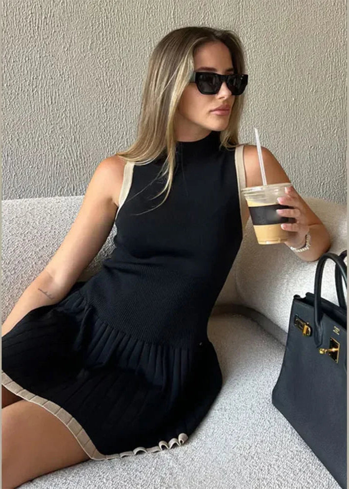 Color Blocked Knitted Mini Dress in elegant design, featuring a stylish contrast of colors and sophisticated bodycon fit