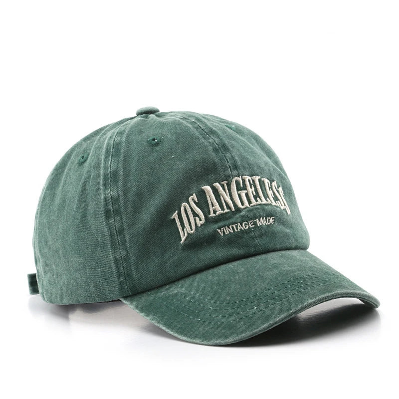 Cotton Baseball Cap in green, offering a fresh pop of color to complete casual outfits.