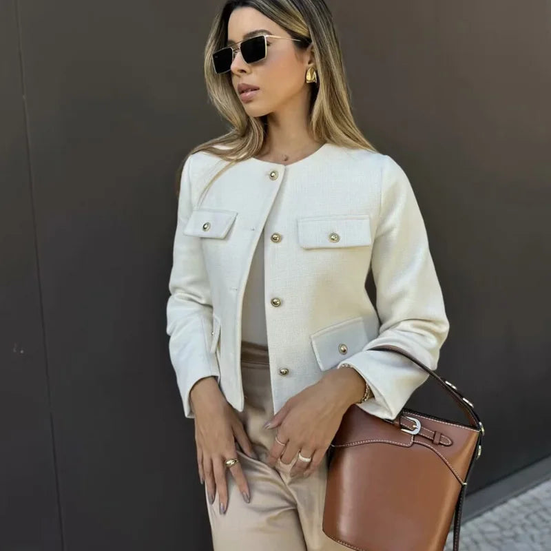 Beige cropped long sleeve jacket with sophisticated style for fall and winter looks