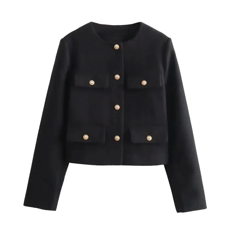 Black cropped jacket with luxury appeal, perfect for fall and winter fashion