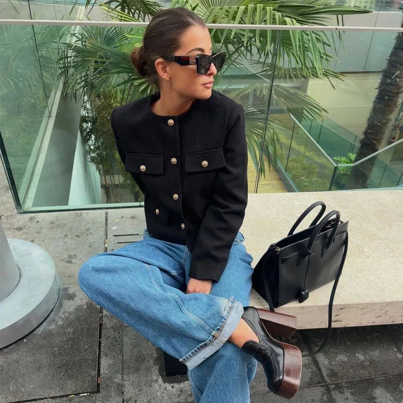 Sophisticated black cropped long sleeve jacket for an elevated and polished look