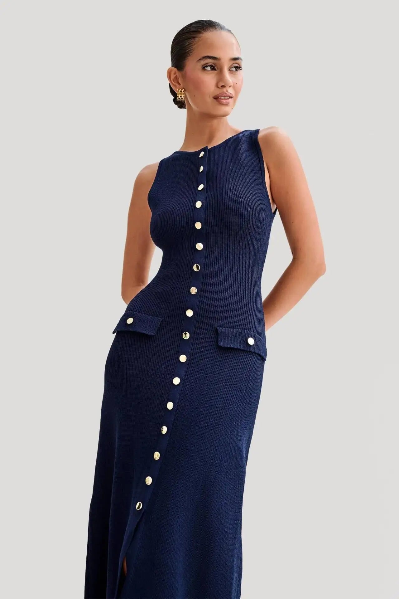 Flattering blue knitted dress with sophisticated fit, ideal for office and formal settings
