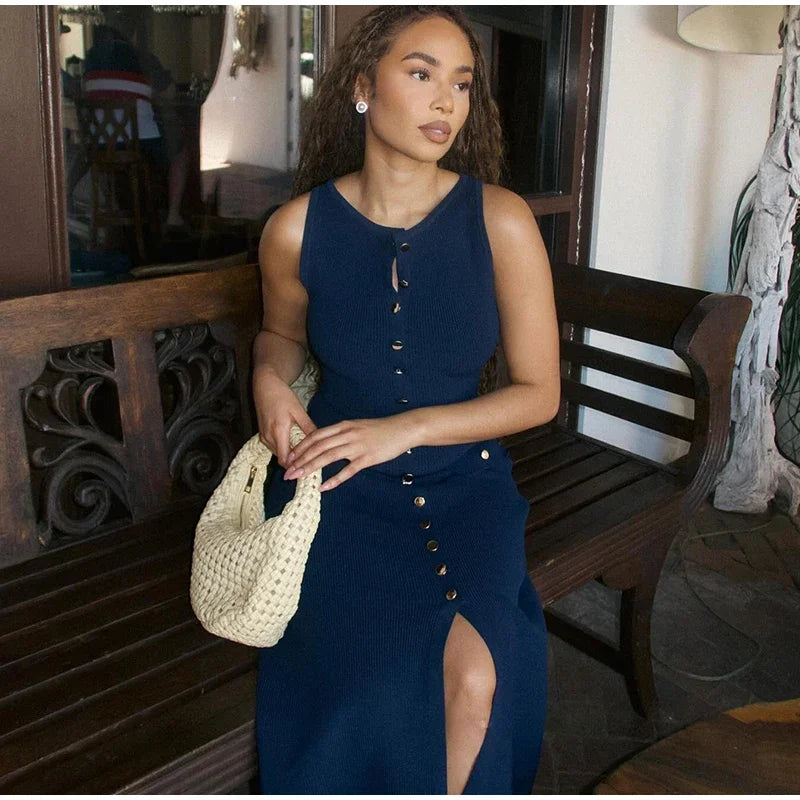 Chic blue knitted dress with luxurious detailing, perfect for high-end fashion and workwear