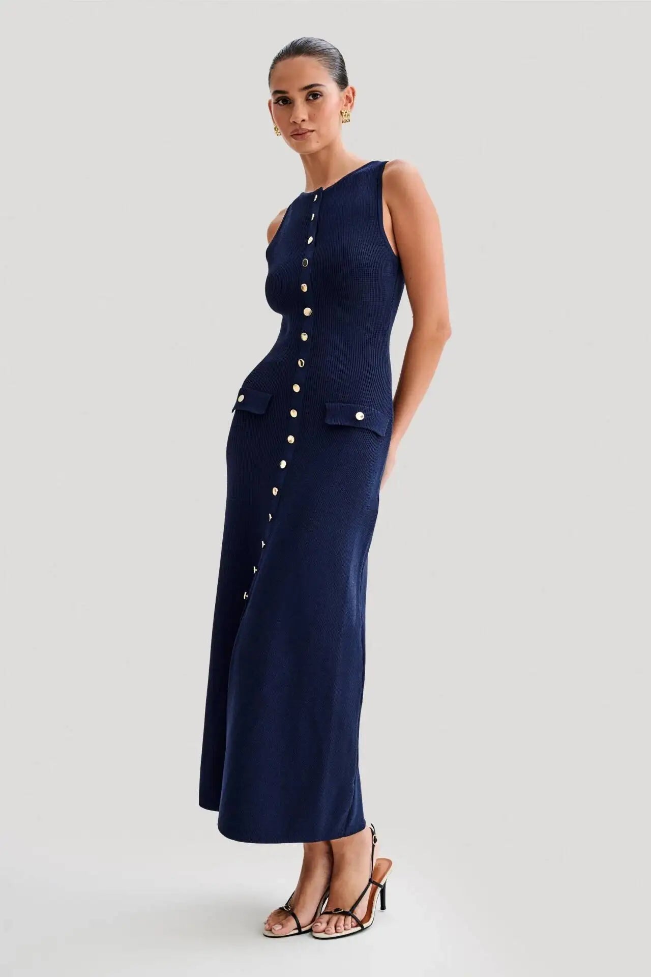 Navy blue elegant knitted dress showcasing high-end luxury fashion with an old money aesthetic