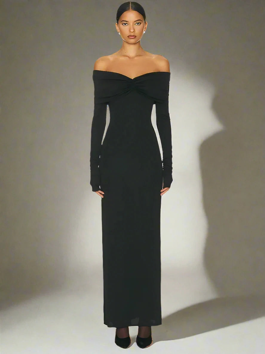 Classic black off-shoulder maxi dress, ideal for formal winter parties.
