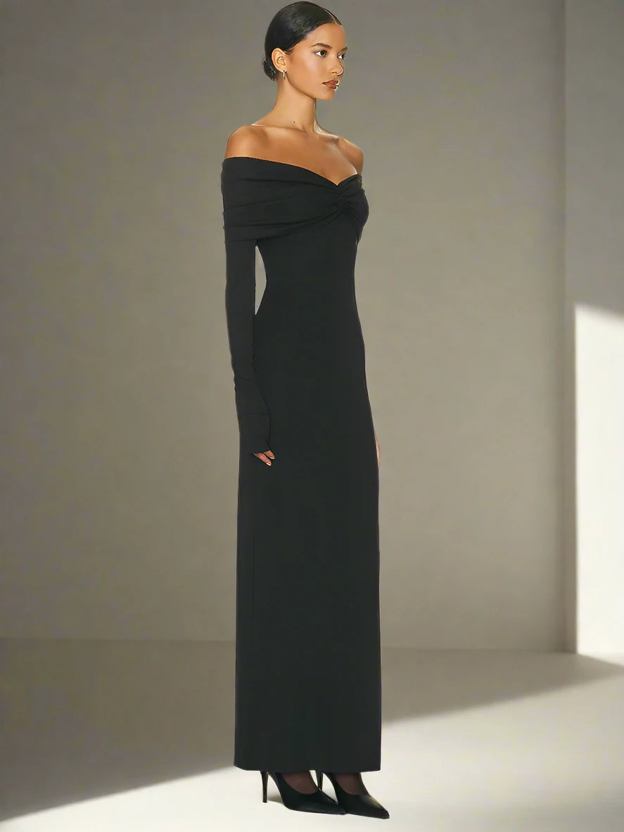 Black off-shoulder maxi dress showcasing timeless elegance and sophistication.