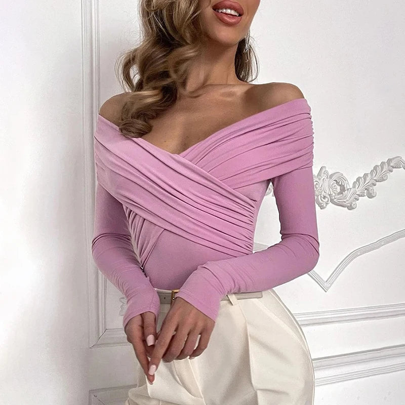 Elegant pink corset bodysuit with an off-shoulder design, a must-have for modern style.