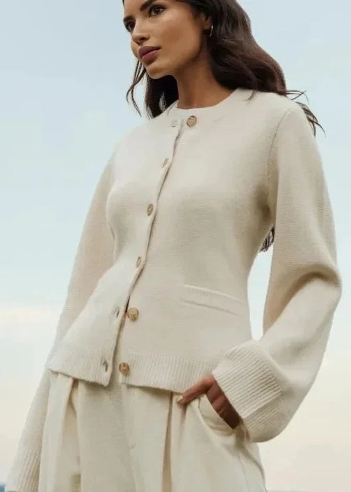 Beige flare sleeve knit cardigan exuding old money style, perfect for an elegant and refined wardrobe.