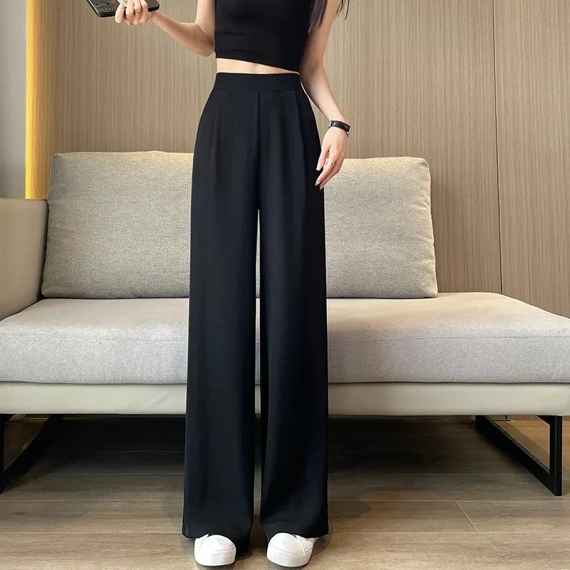 Modern high-waist wide-leg pants in black, a versatile choice for workwear or casual looks