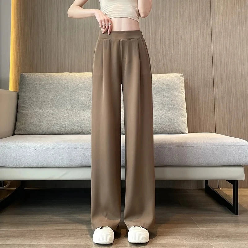 Neutral khaki high-waist wide-leg pants, a stylish addition to any refined wardrobe