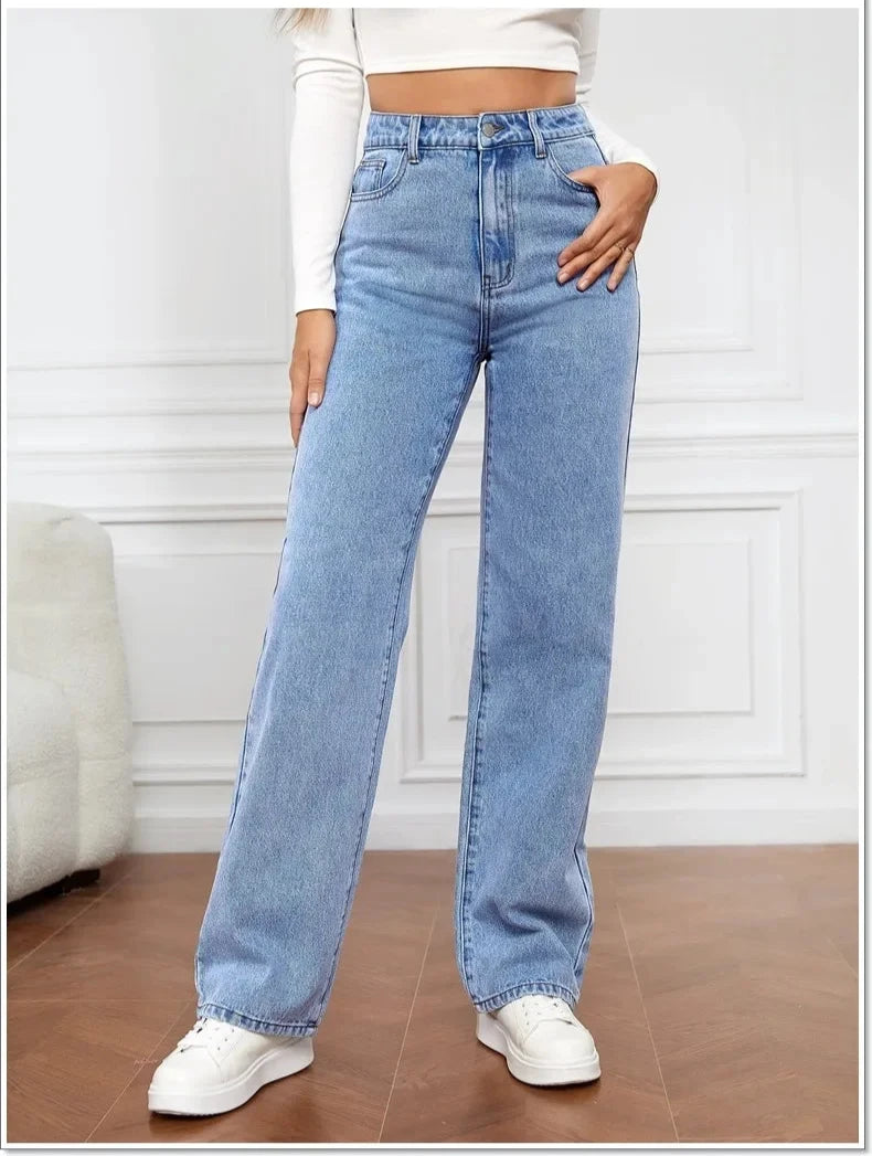 Model wearing Light Blue High-Waisted Straight Leg Jeans for a classic, relaxed denim look.