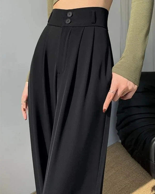Side view of Black High-Waisted Wide-Leg Suit Trousers showcasing a tailored fit and elegant style.