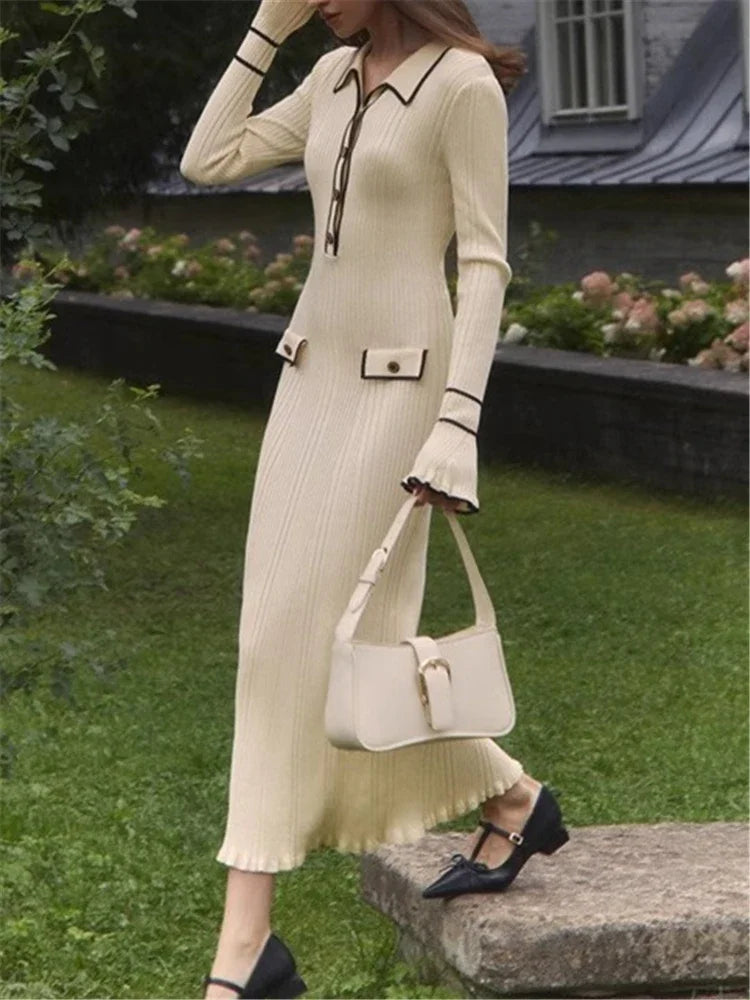 Elevated style with a beige knitted ruffle midi dress, perfect for fall and winter fashion.