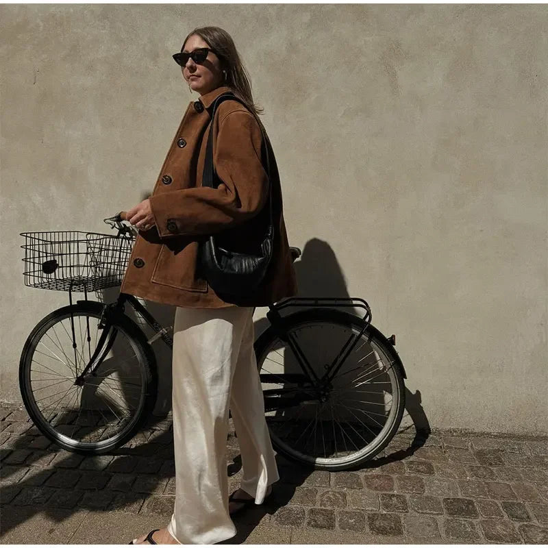 Trendy lapel suede jacket designed for winter, showcasing the season's must-have fabric.