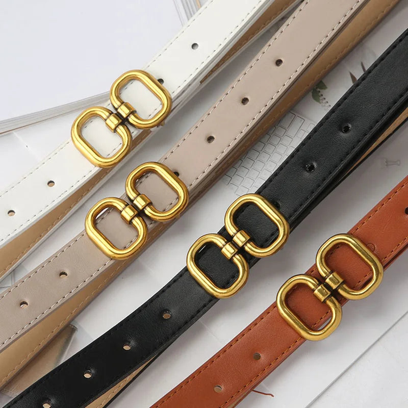 Versatile leather belts in multiple colors, designed with chic metal buckles for every outfit.