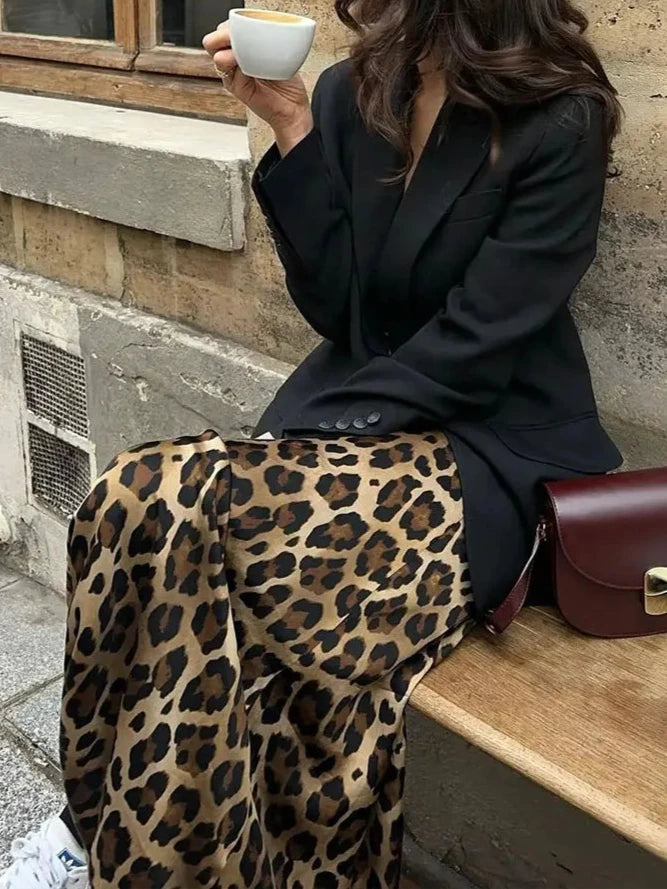 Trendy leopard print midi skirt, perfect for casual and elevated everyday looks.