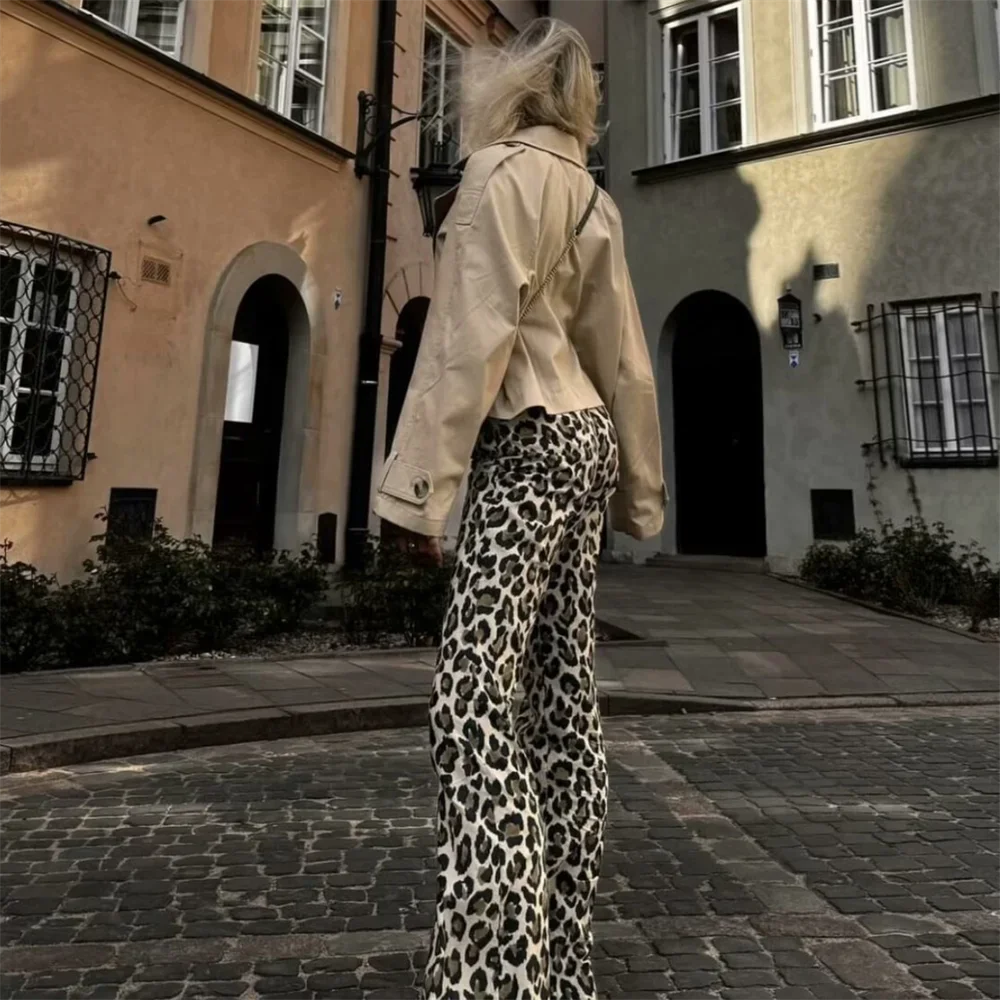 Back view of Leopard Print Pants on blonde model, highlighting pocket details and high-waisted design.