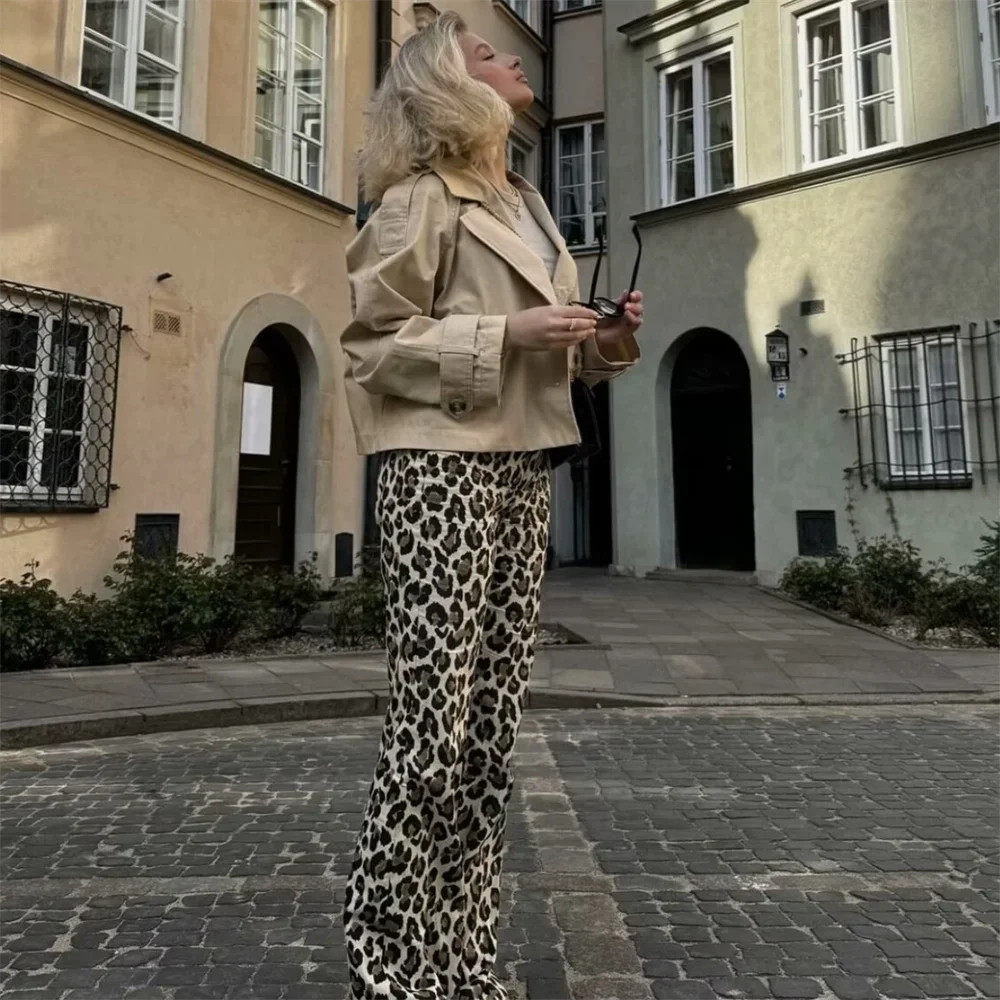 Side view of Leopard Print Pants on blonde model, perfect for a vintage-inspired look with animal print.