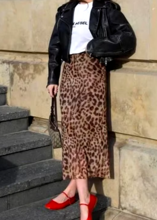 Leopard tulle midi skirt with elegant layers, perfect for sophisticated outfits.
