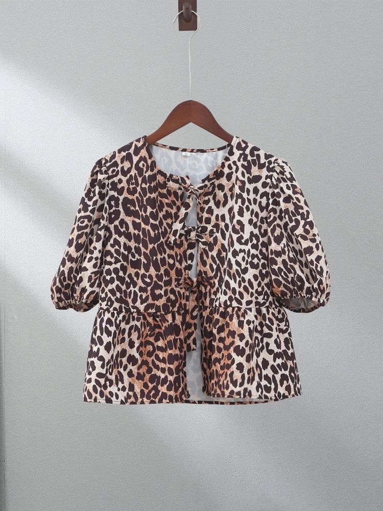 Leopard linen lace-up long sleeve blouse, featuring a bold and stylish print.